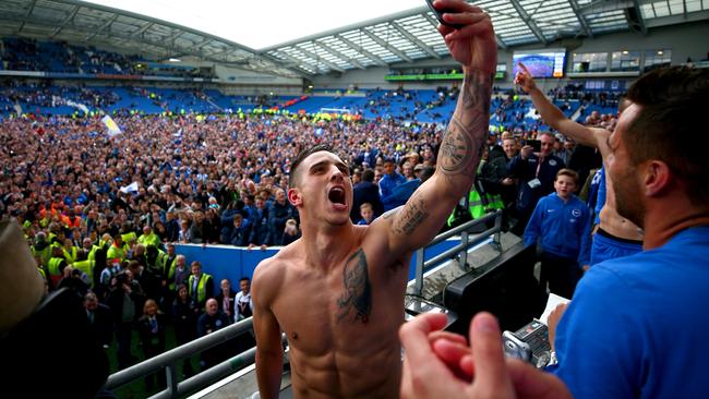 Brighton &amp; Hove Albion celebrates promotion to the Premier League.