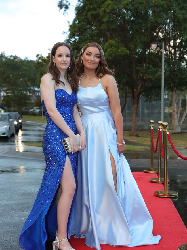 Pacific Pines High formal, at the school. Hannah Maitland and Piper Craig Picture Glenn Hampson