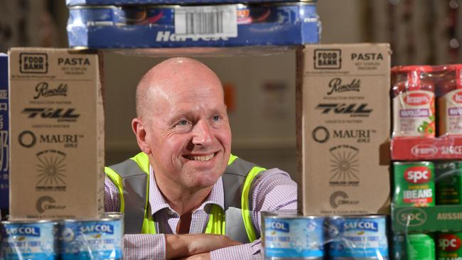 Foodbank SA CEO Greg Pattinson in the warehouse at Edwardstown. Picture: AAP / Keryn Stevens