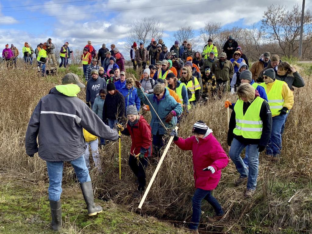 Volunteers searching for Jayme in October after her parents were found fatally shot. Picture: AP Photo/Jeff Baenen, File 
