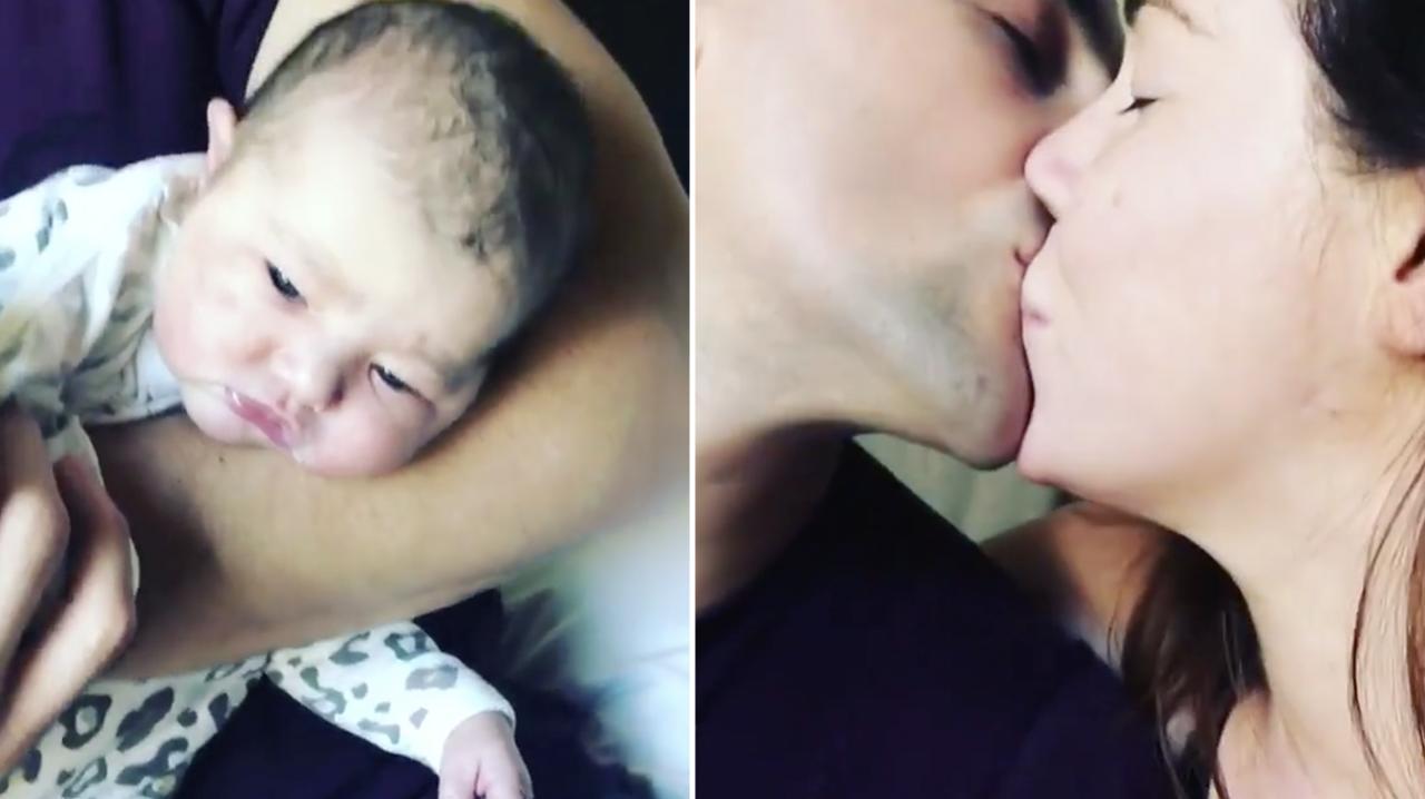 Sophie Cachia shares a moment with her husband and baby