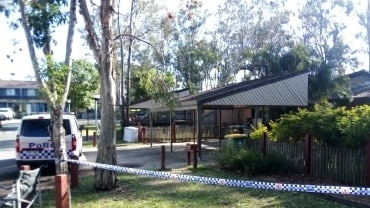 Police were standing guard at the unit on Monday morning.