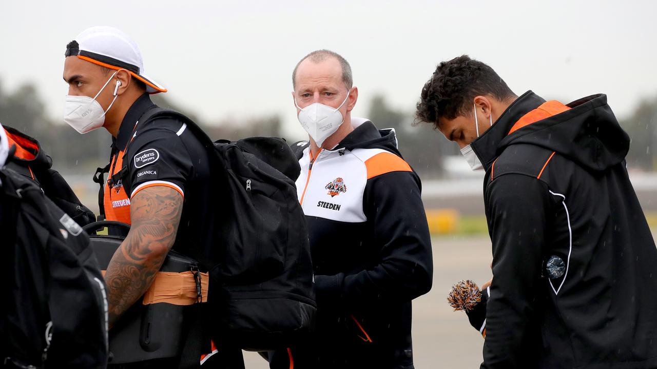 Maguire and his Wests Tigers players arrive in Queensland as part of the Covid relocation.