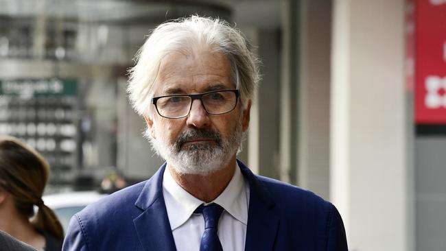 Australian actor John Jarratt arrives at the Downing Centre Local Court in Sydney, Tuesday, July 2, 2019. (AAP Image/Bianca De Marchi) NO ARCHIVING