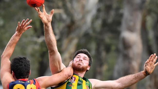 AFL action in Noosa between Noosa Tigers and Maroochydore Roos. Maroochydore's Jacob Simpson.