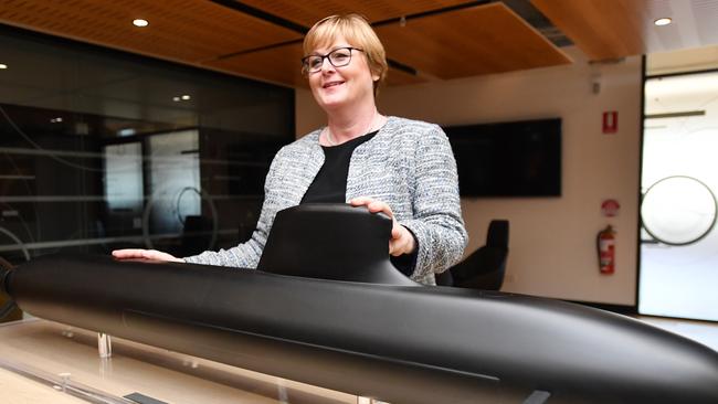 Defence Minister Linda Reynolds with a model of the submarine to be supplied by the French. Picture: AAP