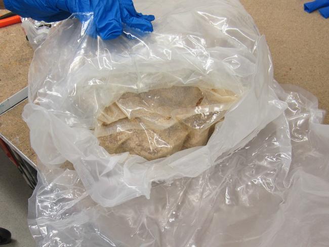 Two men were been arrested after more than 5kg of ecstasy – with an estimated street value of more than $2 million was found in a package sent through the post. Picture: SAPOL