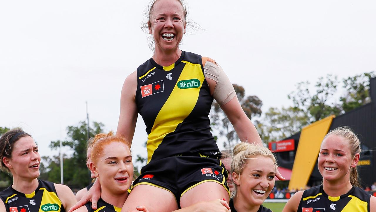 Courtney Wakefield is chaired off the ground in her fairwell game. Picture: Dylan Burns/AFL Photos via Getty Images