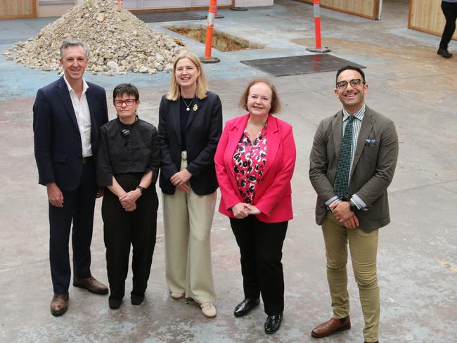 St Vincent de Paul Housing Australia CEO Graham West, Housing Tasmania CEO Eleri Morgan-Thomas, Federal member for Franklin Julie Collins, Senator Carol Brown and member for Clark Simon Behrakis at the former Vinnies shop now the site of the 38 apartment development on Argyle St. Picture: Elise Kaine