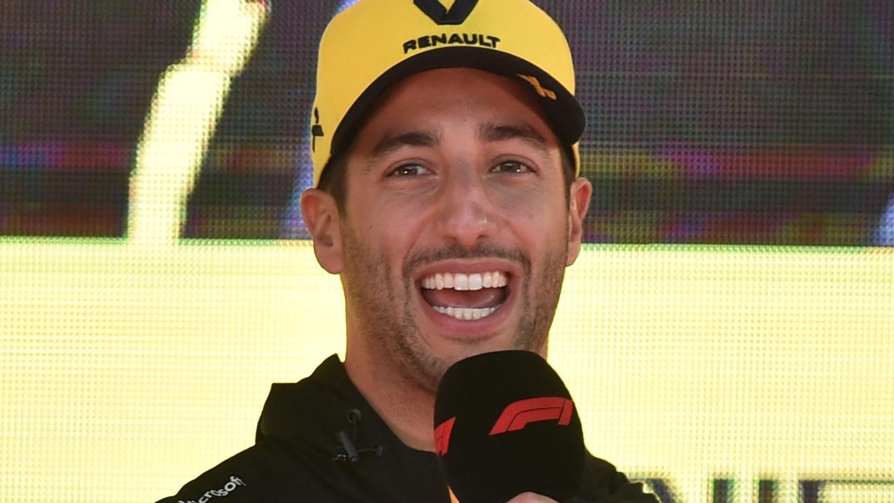 Daniel Ricciardo greets fans during an F1 live event.