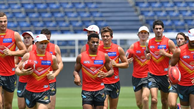 Gold Coast Sun players are seen during a training session at the Adelaide Arena (AAP Image/David Mariuz)