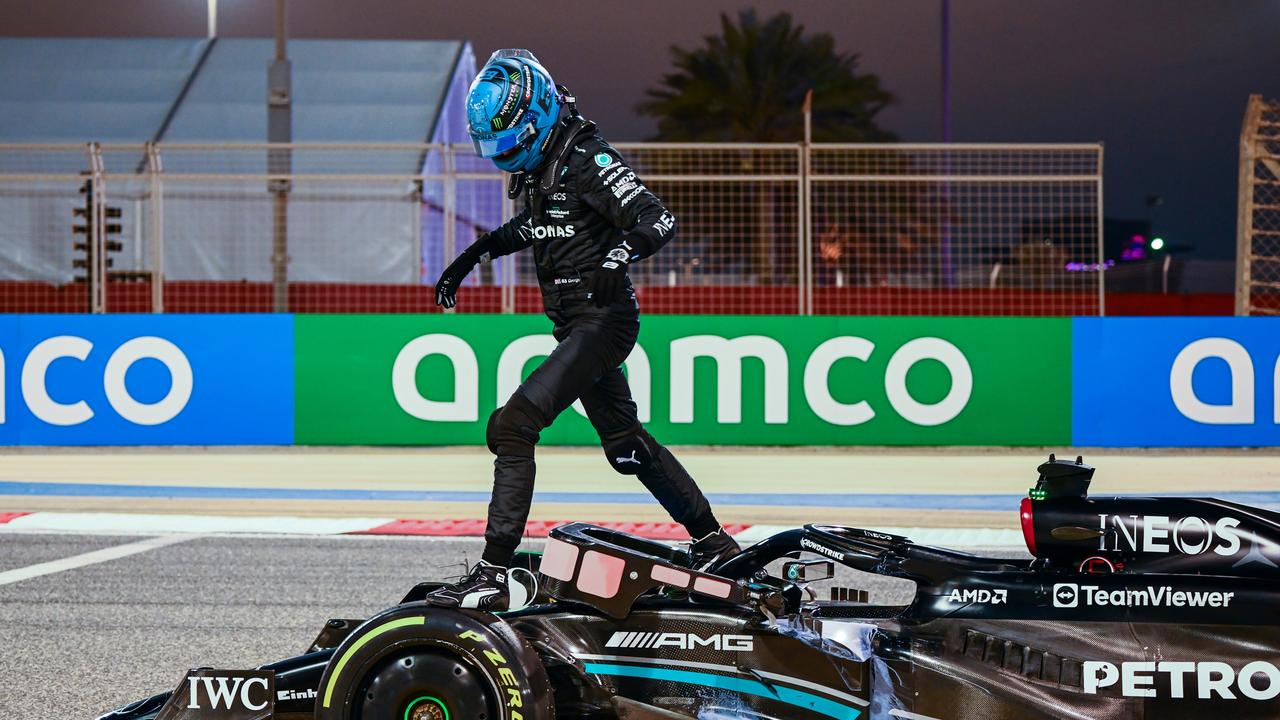 BAHRAIN, BAHRAIN - FEBRUARY 24: George Russell of Great Britain and Mercedes climbs from his car after stopping on track during day two of F1 Testing at Bahrain International Circuit on February 24, 2023 in Bahrain, Bahrain. (Photo by Clive Mason/Getty Images)