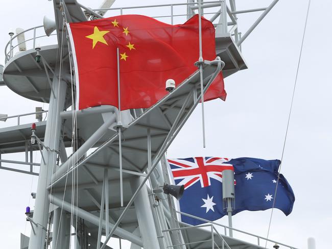 Chinese Naval ships docked at Garden Island in Sydney. With the Australian and Chinese flags flying.