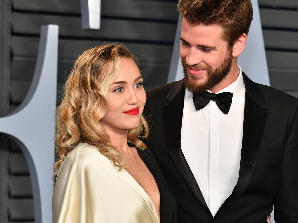 Miley Cyrus (L) and Liam Hemsworth attend the 2018 Vanity Fair Oscar Party hosted by Radhika Jones. Picture: Getty Images