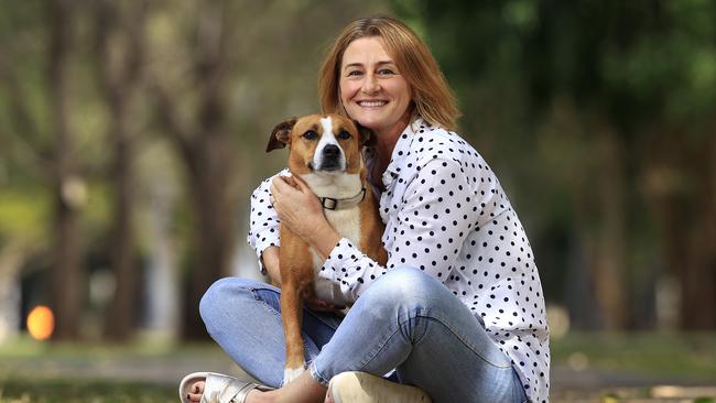 Tanya Boots quit her corporate job due to burnout and is now running a small business. With dog Marley. Picture: Adam Head