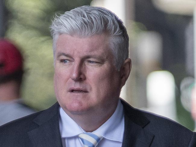 SYDNEY, AUSTRALIA - NewsWire Photos - NOVEMBER 22, 2024:Former cricketer Stuart MacGill arrived at Downing Centre Court charged with taking part in a $330,000 cocaine deal that police allege led to the spin bowler being kidnapped. Picture: NewsWire / Simon Bullard.