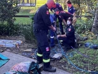 A man has been rescued from a septic tank, thanks to a teen girl and her barking dog. Picture: Fire and Rescue NSW.