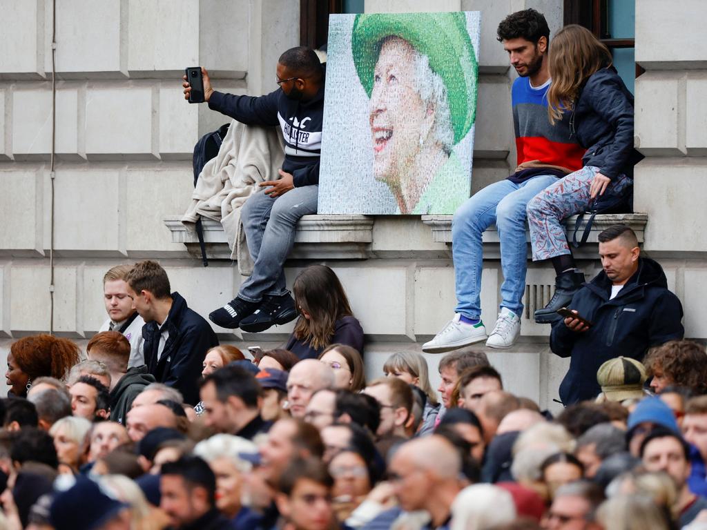 Members of the public gather at Parliament Square for the State Funeral of Queen Elizabeth II at Westminster Abbey. Picture: Getty