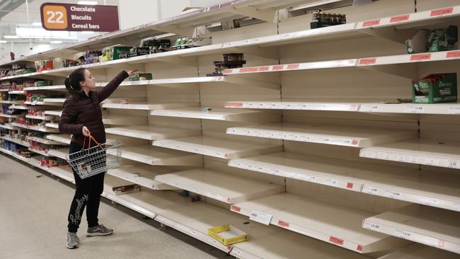 Empty shelves confront shoppers at the Nine Elms branch of Sainsburys in March last year in London. Picture: Getty Images