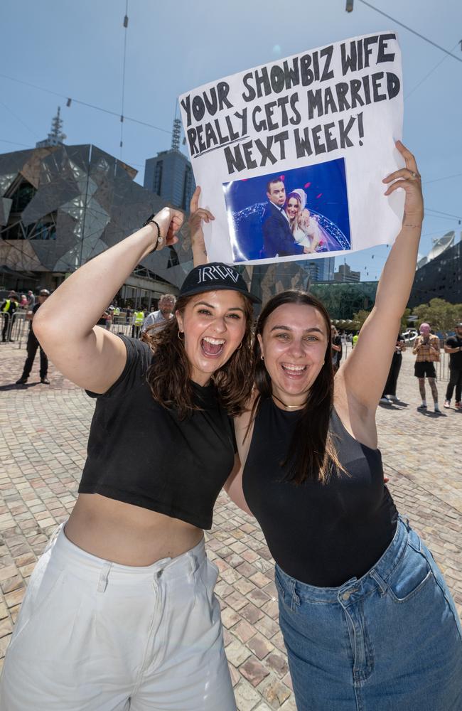 Georgie Potter and Jordann West rocked up early to secure front-row spots for Robbie’s concert. Picture: Tony Gough