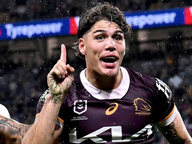 BRISBANE, AUSTRALIA - APRIL 20: Reece Walsh of the Broncos celebrates after scoring a try during the round seven NRL match between the Brisbane Broncos and Canberra Raiders at Suncorp Stadium, on April 20, 2024, in Brisbane, Australia. (Photo by Bradley Kanaris/Getty Images)