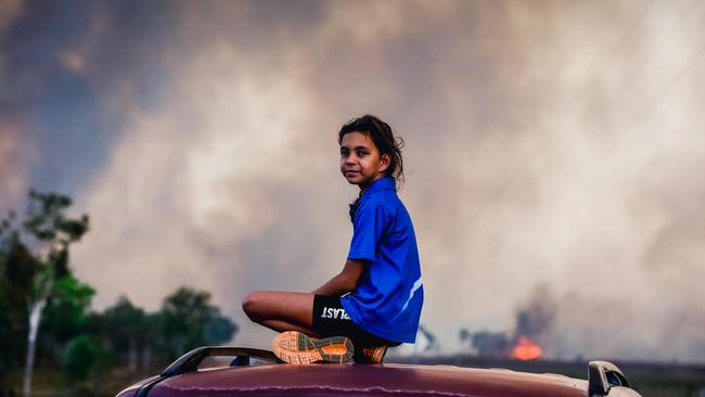 Kayla Broome, 9, as Dangerous fire conditions continue and a fire rolls through her family property in the Litchfield/Batchelor Area Picture GLENN CAMPBELL