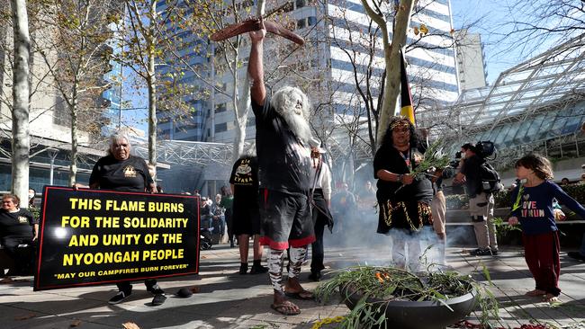 Protesters at a rally outside the Rio Tinto office in Perth in June last year. Picture: AAP