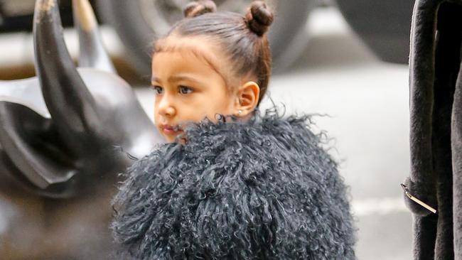 North West, the daughter of Kim Kardashian and Kanye West, has a predominately custom-made wardrobe (and she’s only four). Picture: Splash