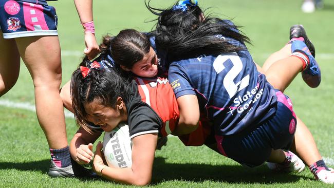 No way through the tough Mabel Park defence. Pic: Shae Beplate.