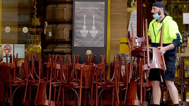 Furniture is removed from the Hopetoun Tea Rooms at The Block Arcade on Collins Street. Picture: Andrew Henshaw