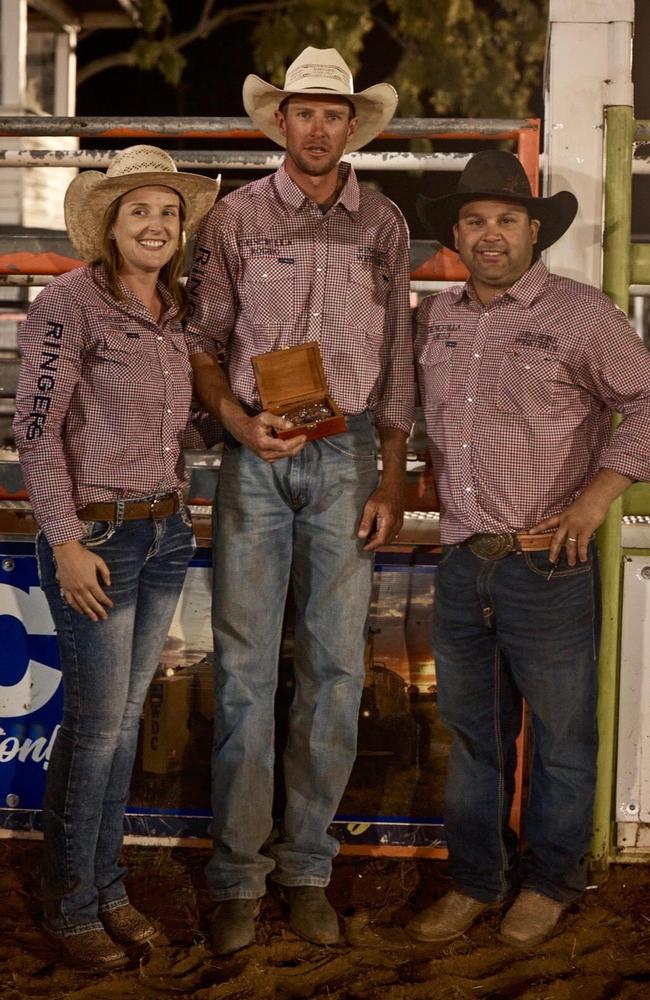 Chinchilla Rodeo president Darryl Chong (right) with vice president Kristen Chong and inaugural Jack Holt Memorial open bull riding champion Jack McArthur From Cooyar.