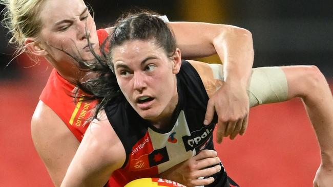 GOLD COAST, AUSTRALIA - AUGUST 31: Alice Burke of the Saints competes for the ball against Daisy D'Arcy of the Suns  during the round one AFLW match between Gold Coast Suns and St Kilda Saints at People First Stadium, on August 31, 2024, in Gold Coast, Australia. (Photo by Matt Roberts/Getty Images)