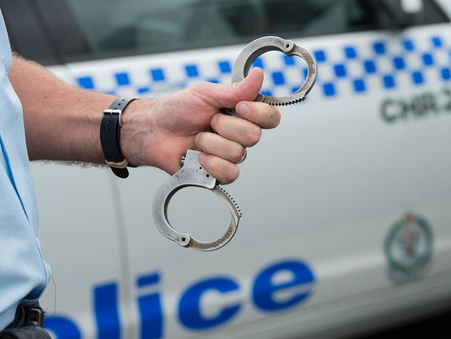 NSW police at coffs harbour boat ramp, arrest , gun, shots, handcuffsPhoto: Trevor Veale / The Coffs Coast Advocate