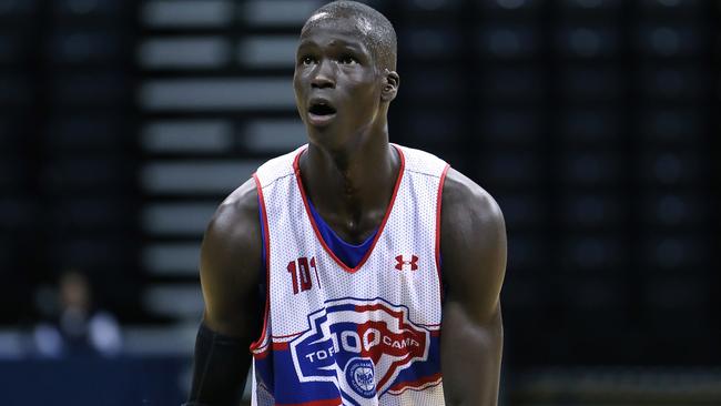 CHARLOTTESVILLE, VA - JUNE 15: Thon Maker #101 shoots a free throw during the NBPA Top 100 Camp on June 15, 2013 at John Paul Jones Arena in Charlottesville, Virginia. (Photo by Kelly Kline/Getty Images)
