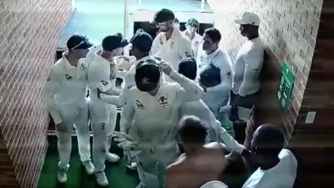 David Warner being restrained by his teammates during an argument with South African batsman Quintin de Kock was one of several ugly incidents on the tour in 2018