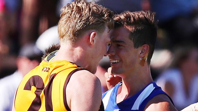 James Sicily and Jy Simpkin go toe to toe late in the game.