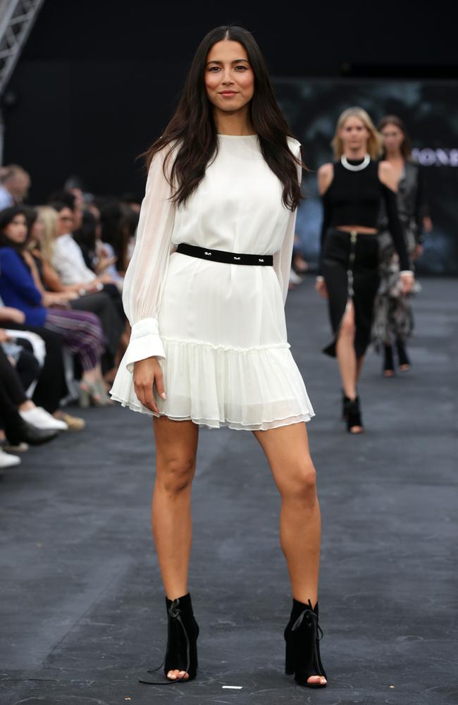 Jessica in a third outfit, a Manning Cartell sheer white mini-dress and belt cinched at the waist. Picture: Jonathan Ng