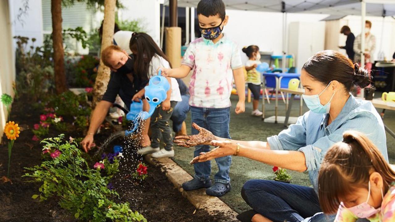 Prince Harry and Meghan Markle gardening alongside young students at Preschool Learning Center in Los Angeles. Picture: Instagram.