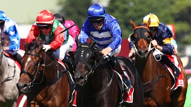 SYDNEY, AUSTRALIA - MARCH 30: Tommy Berry riding Wymark  wins Race 4 Toyota Forklifts Tulloch Stakes during "Stakes Day" - Sydney Racing at Rosehill Gardens on March 30, 2024 in Sydney, Australia. (Photo by Jeremy Ng/Getty Images)