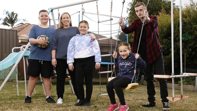 Tracey Schofield has managed to save over $4000 after using some of the NSW Government's rebates. Pictured from left: Liam, 11, Emma, 10, Lucy, 7, and Blake, 16. Picture: Jonathan Ng