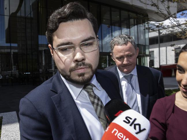CANBERRA, AUSTRALIA NewsWire Photos OCTOBER 27, 2022:Bruce Lehrmann is the man accused of the sexual assault of former Liberal staffer Brittany Higgins left the Magistrates Court in Canberra, with his lawyers. Defence lawyer Steve Whybrow had his arm around him as support as they left.Picture: NCA NewsWire / Gary Ramage