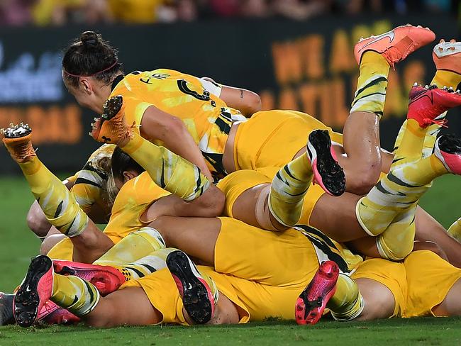 Australia's players celebrates their first goal against China's during the women's Olympic football tournament qualifier match between Australia and China in Sydney on February 13, 2020. (Photo by Saeed KHAN / AFP) / -- IMAGE RESTRICTED TO EDITORIAL USE - STRICTLY NO COMMERCIAL USE --