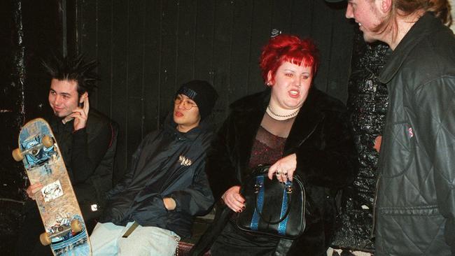 Colourful customers wait outside for Proscenium nightclub to open its doors on Peel Street in 1998. Picture: Pat Hannagan