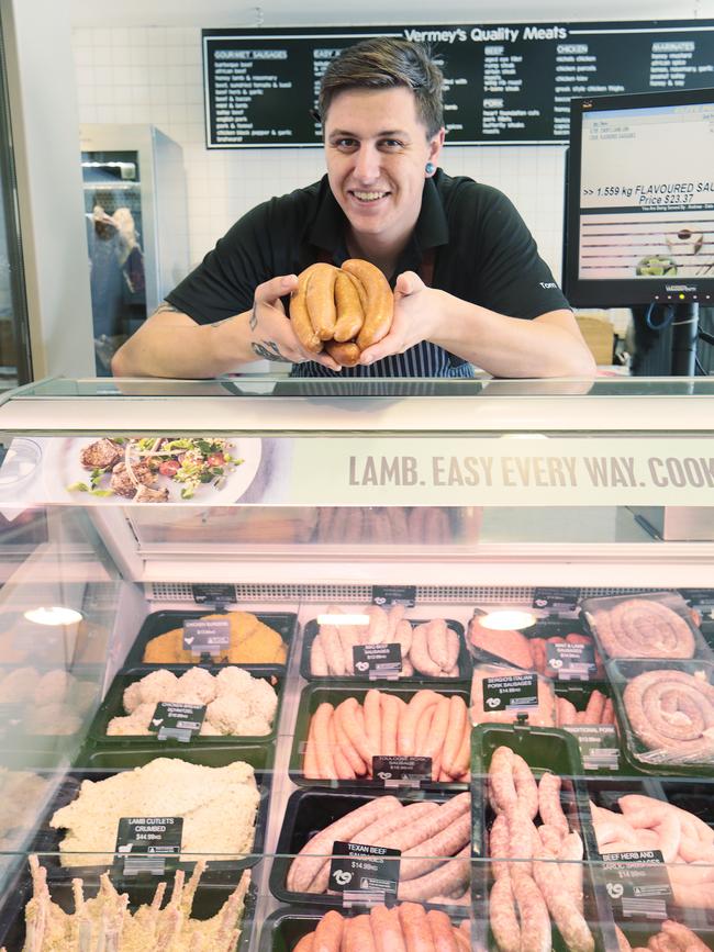 Tom Patman serves up some of Vermey’s fine sausages. Picture: MATHEW FARRELL