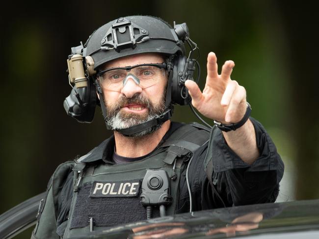 An AOS (Armed Offenders Squad) member is seen following a shooting at the Masjid Al Noor mosque in Christchurch. Picture: AAP