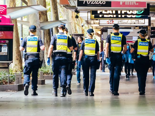 MELBOURNE, AUSTRALIA - FEBRUARY 15, 2021: Police patrol the streets of Melbourne at the start of a 'circuit breaker' lockdown imposed suddenly by the Victorian Government. This is due to increasing numbers of COVID-19 cases in north western Melbourne.- PHOTOGRAPH BY Chris Putnam / Future Publishing (Photo credit should read Chris Putnam/Future Publishing via Getty Images)