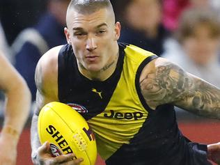 AFL 2nd Qualifying Final. Geelong v Richmond at the MCG . Richmonds Dustin Martin slips the tackle of Geelong's Mitch Duncan  . Pic: Michael Klein