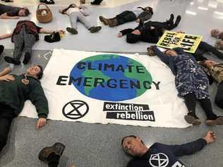 CLIMATE: The local Extinction Rebellion movement, pictured at a recent activity at Lismore Shopping Square, is one of the organisation that called for the protest this weekend. Picture: Sophie Moeller