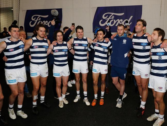 MELBOURNE, AUSTRALIA – JULY 16: Geelong Cats sing the team song during the 2022 AFL Round 18 match between the Carlton Blues and the Geelong Cats at the Melbourne Cricket Ground on July 16, 2022 in Melbourne, Australia. (Photo by Dylan Burns/AFL Photos via Getty Images)