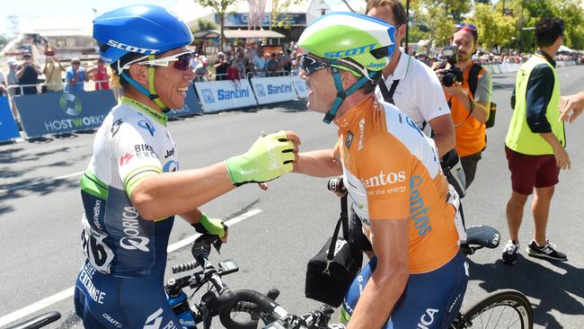 24/01/16 - Orica GreenEDGE team mates Caleb Ewan and Simmon Gerrans hug after Stage 6 of the Tour Down Under in Adelaide. Photo Tom Huntley